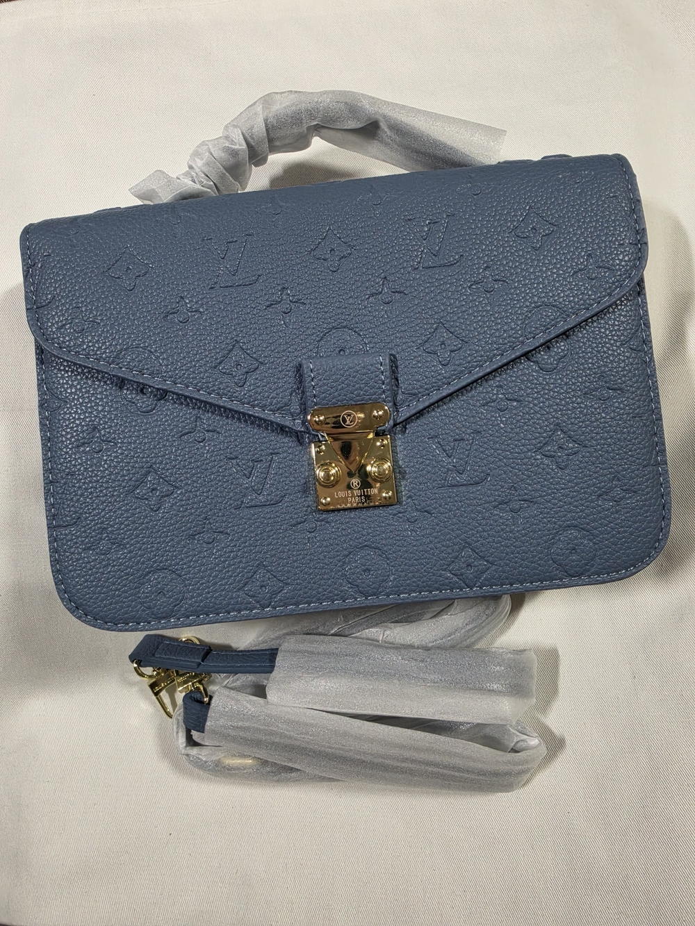 Blue Embossed Crossbody Bag